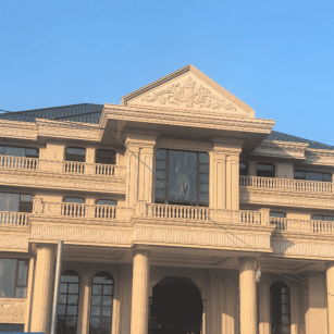 达州黄金麻别墅外墙干挂石材效果示例