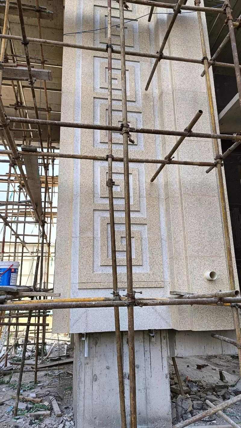 达州 黄金麻花岗岩别墅外墙干挂回纹造型效果