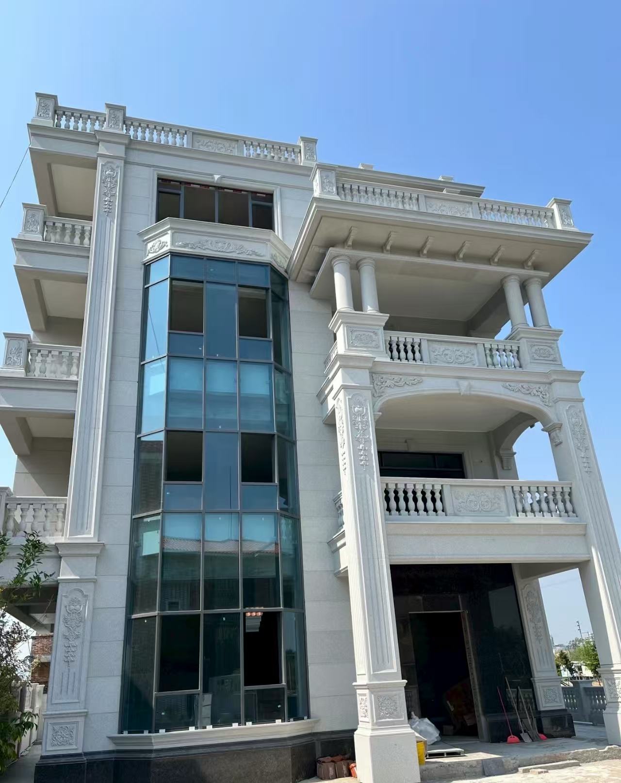 达州 白麻花岗岩别墅外墙干挂效果展示