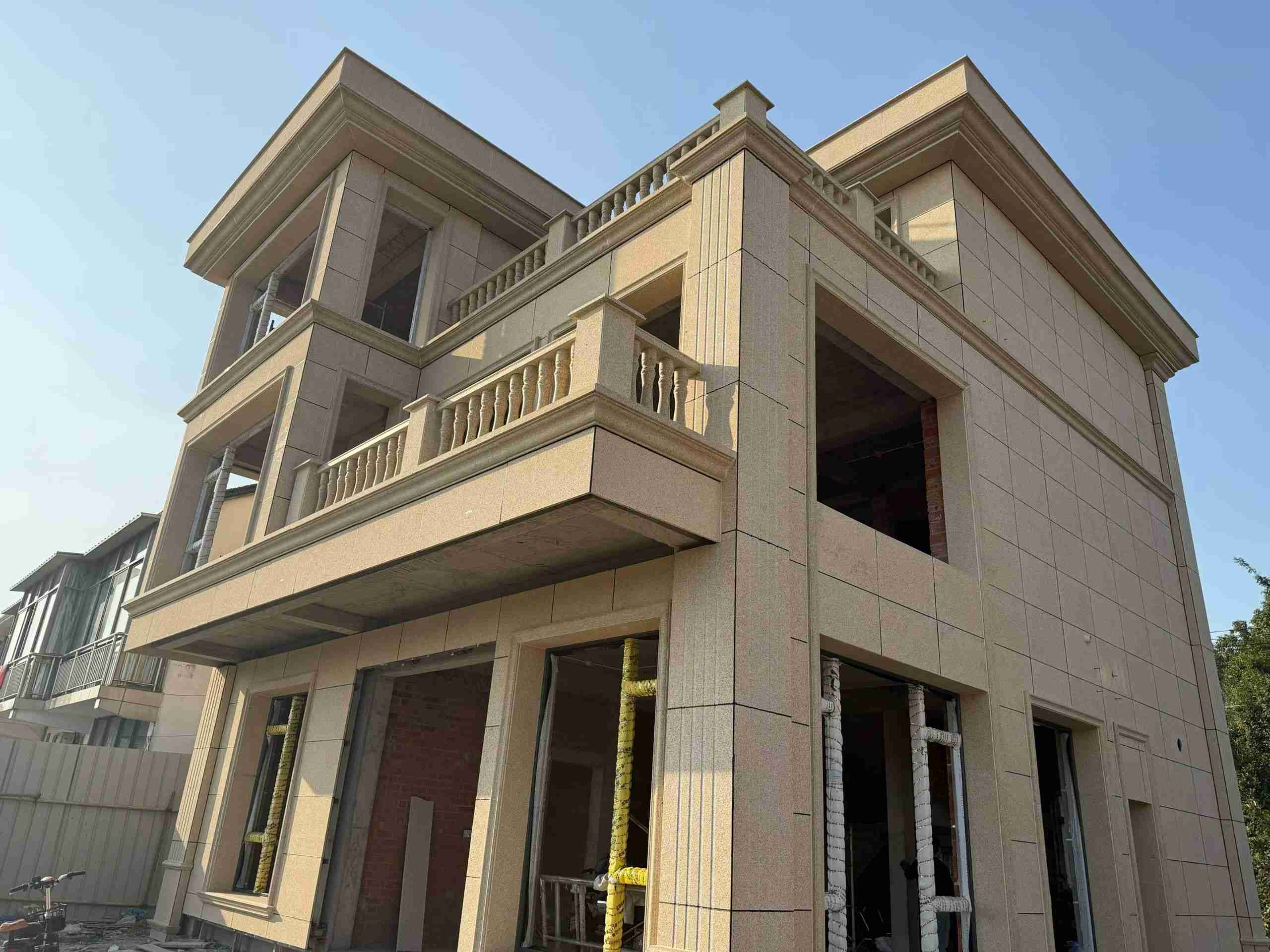 达州 黄金麻花岗岩石材荔枝面外墙干挂效果展示